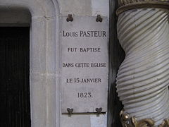 Plaque rappelant le baptême de Louis Pasteur.