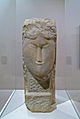 Tête de femme (ca 1913) marbre blanc d’A. Modigliani (1884-1920)