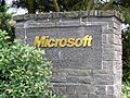 Sign bearing the Microsoft logo at an entrance to Microsoft's Redmond campus.
