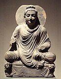 Buda assegut (Gandhara) amb la funció de representar la imatge del Déu del budisme