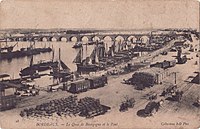 Vue du quai Richelieu (ancien quai de Bourgogne) et du pont de pierre vers 1880.