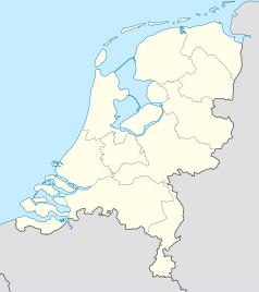 Mapa konturowa Holandii, w centrum znajduje się punkt z opisem „Amsterdam”