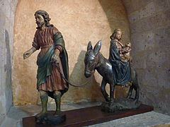 La Fuite en Égypte, œuvre de bois sculpté XVe siècle.