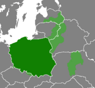 Carte : Pologne (vert foncé) et zones de Tchéquie, Biélorussie, Ukraine, Lituanie et Lettonie (vert clair).