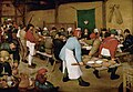 Le repas de noces, par le peintre flamand Pieter Brueghel l'Ancien 1566-69.