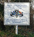 Panneau de jumelage entre les communes de Saint-Ouens et Coutances. En anglais et en jersiais, mais pas en français