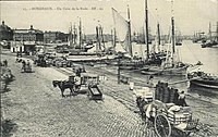 Vue du quai Richelieu (ancien quai de Bourgogne) et de la place de la bourse vers 1880.