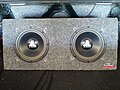Two 10-inch subwoofers in the trunk of a car