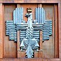 Armoiries de la Pologne, façade du bâtiment de la poste à Varsovie (1934)[35].