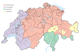 Carte principalement rouge (allemand) ; violet (français) à l'est ; vert (italien) et jaune (romanche) au sud-ouest.