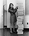 Image 11Margaret Hamilton standing next to the navigation software that she and her MIT team produced for the Apollo Project.