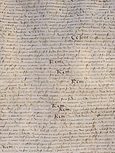 Détail du texte original du traité d'Arras - exposé au Musée de Cluny en 2024.