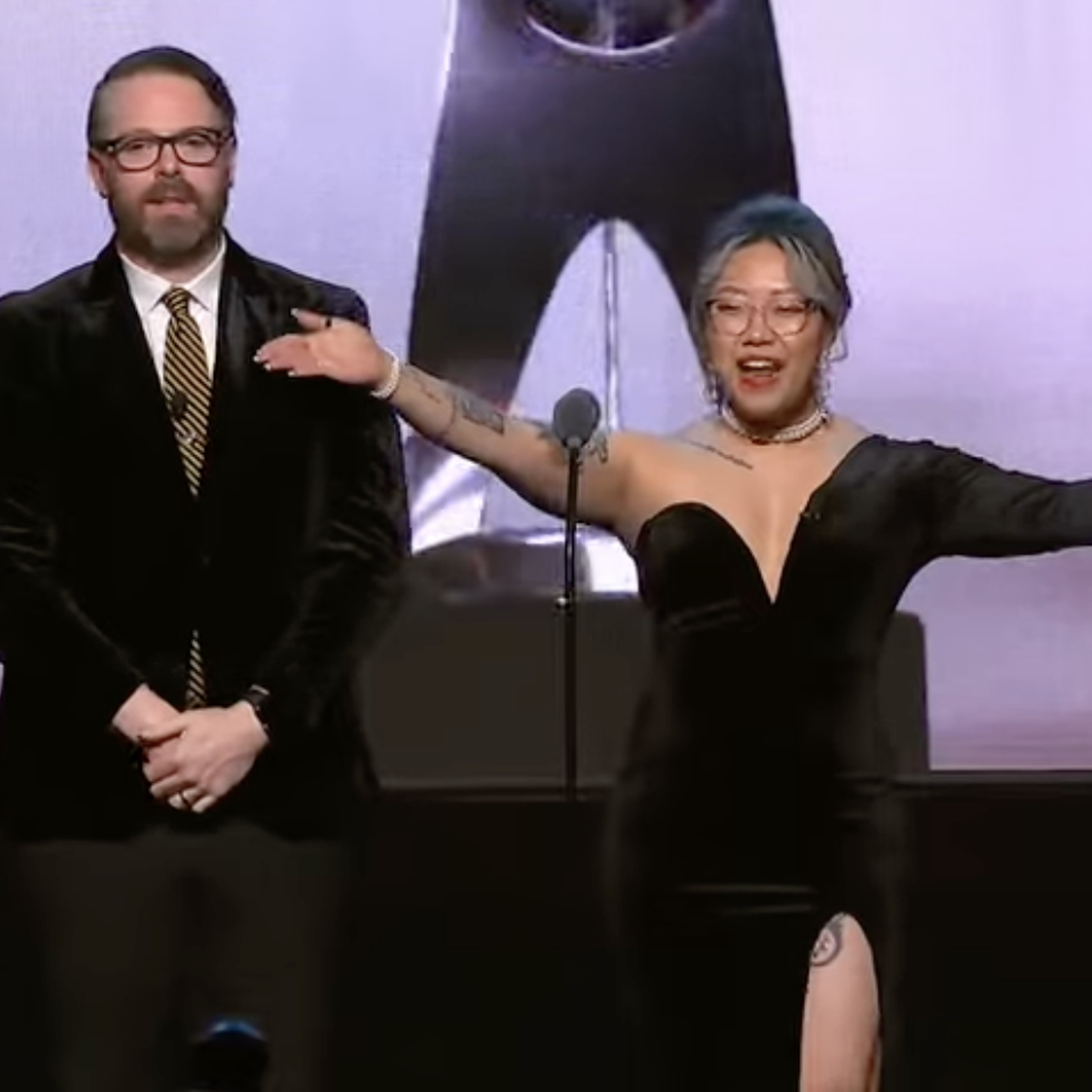 Screenshot from the 27th Annual D.I.C.E. Awards featuring the event’s two hosts Greg Miller (left) and Stella Chung (right).
