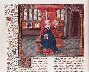 Christine de Pisan assise à côté d'un lutrin et tenant une écritoire. Miniature sur vélin du XVe siècle. (Bibliothèque nationale de France, Paris). Ph. Coll. Archives Larbor 