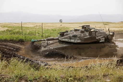 Un tank de l'armée israélienne sur le plateau du Golan, le 10 mai 2018 © MENAHEM KAHANA AFP
