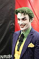 Joker cosplayer (behavior: makeup and costumes, roleplaying)