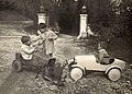 Boys playing at having a car accident (behavior: play, mimicry of adult behaviors)